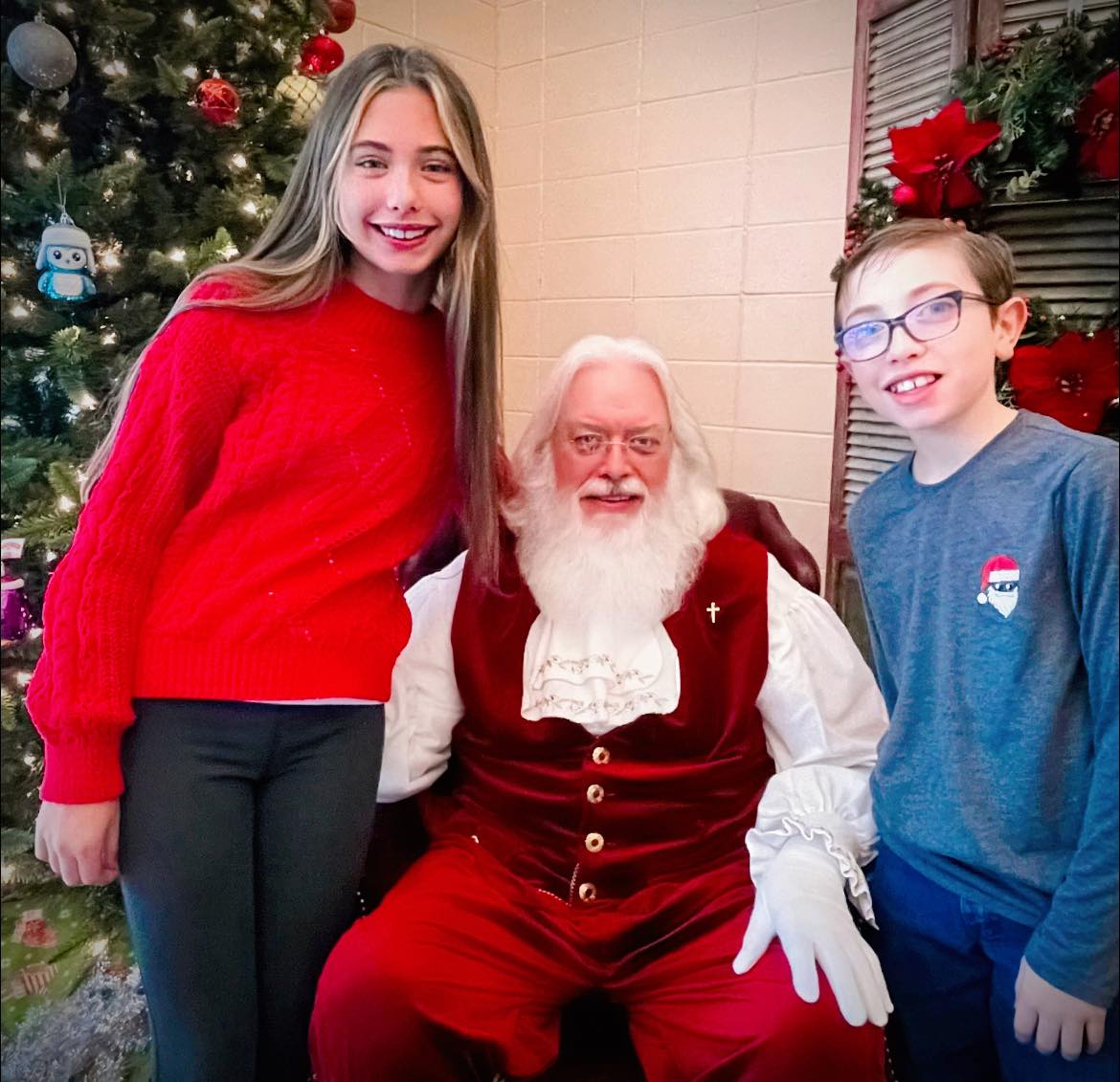 Santa Claus with a girl and boy. 