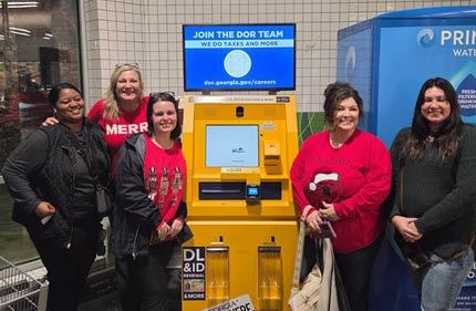Tax Kiosk with Tax Commissioner's staff 